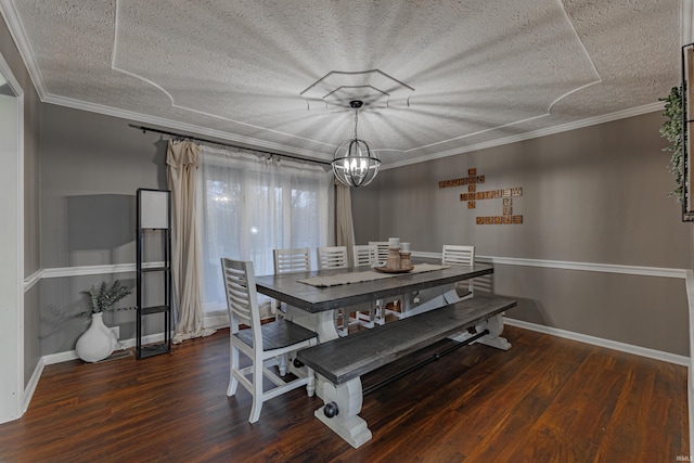 dining area featuring a textured ceiling, dark hardwood / wood-style flooring, crown molding, and a notable chandelier