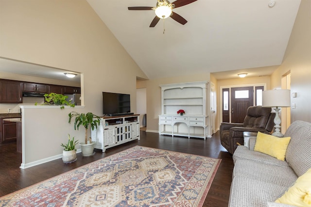 living room featuring ceiling fan, dark hardwood / wood-style flooring, and high vaulted ceiling