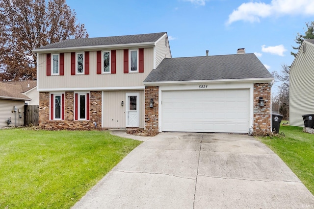 view of front facade featuring a garage and a front lawn