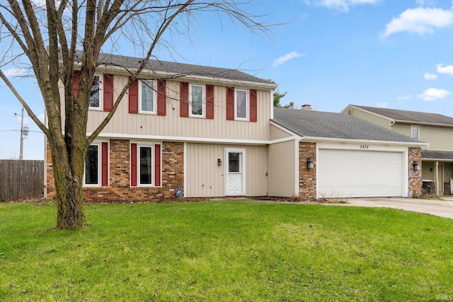 view of front of home with a front lawn and a garage