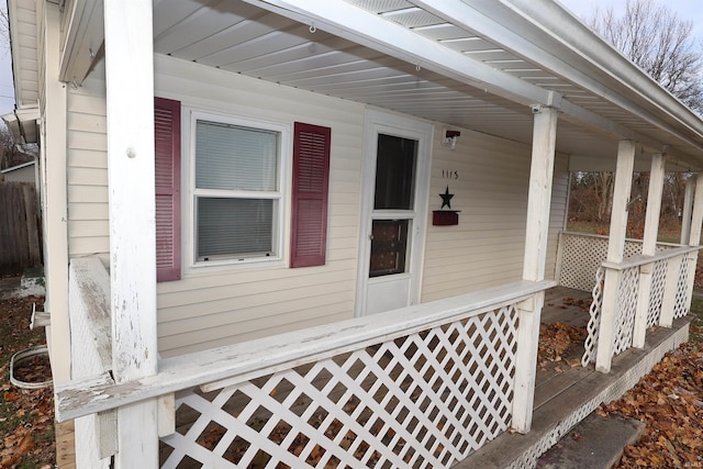 doorway to property with covered porch