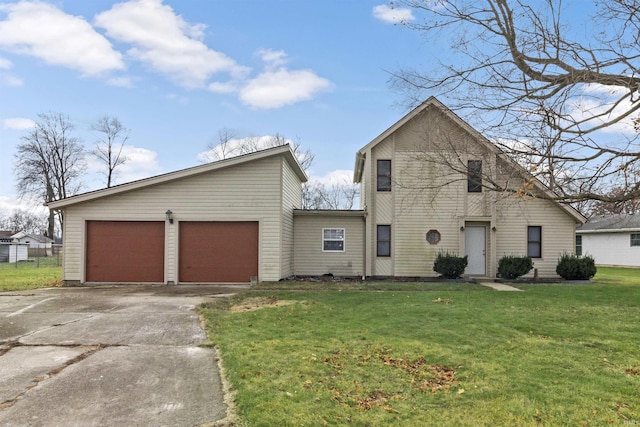 view of front facade featuring a front lawn and a garage