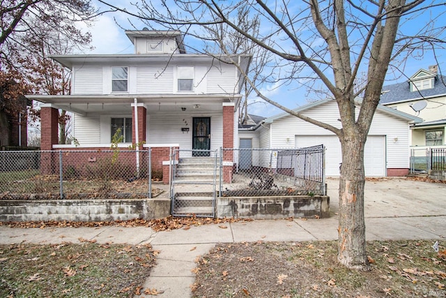 view of front of house with a porch and a garage