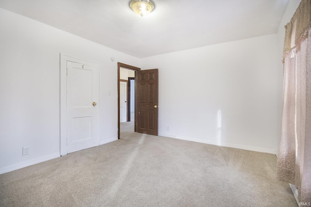 spare room with carpet floors