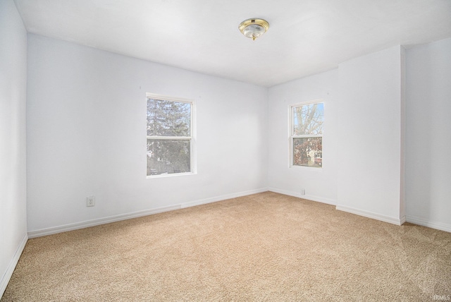 empty room with carpet flooring