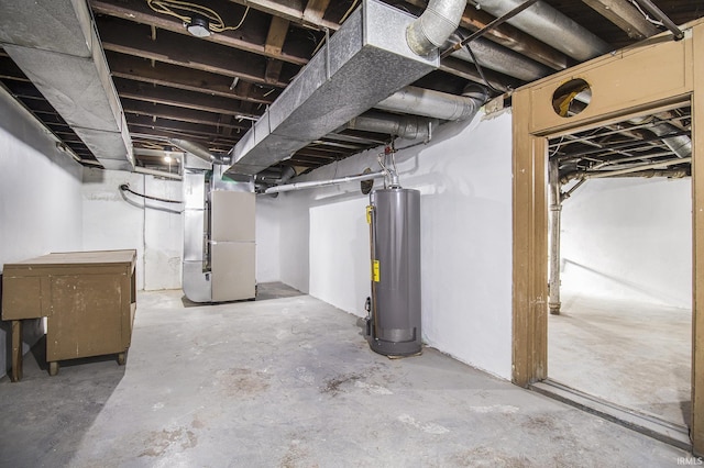 basement with gas water heater and heating unit