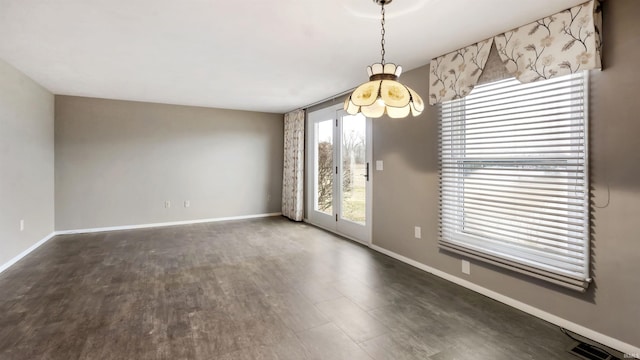 empty room featuring dark hardwood / wood-style floors