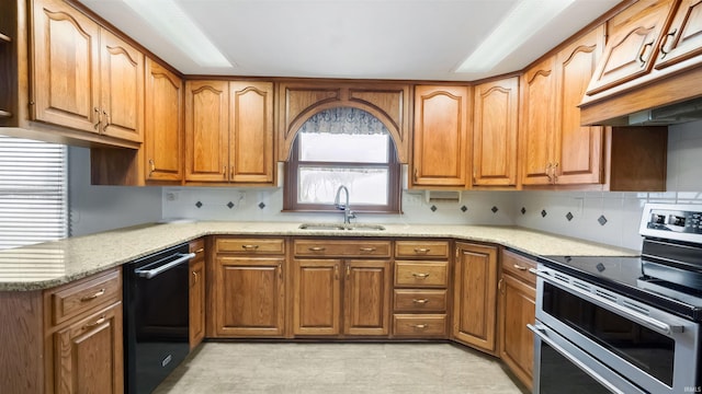 kitchen featuring light stone countertops, sink, dishwasher, stainless steel electric range, and custom range hood