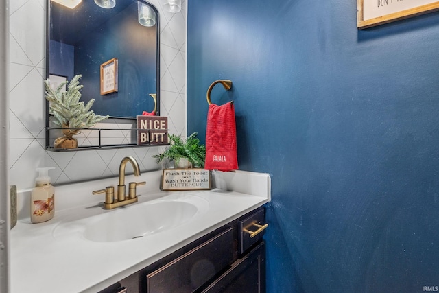 bathroom with vanity and backsplash