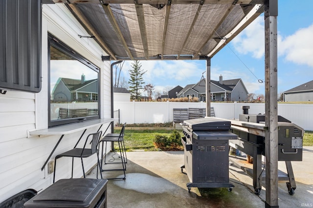 view of patio featuring a grill