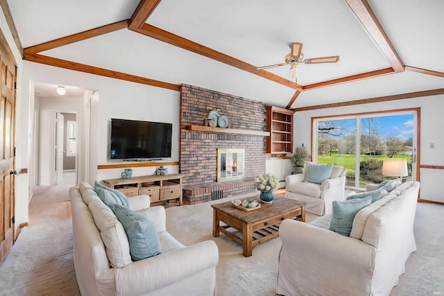 carpeted living room featuring ceiling fan, vaulted ceiling, and a brick fireplace