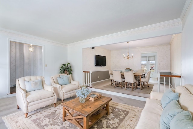 living room with crown molding and a chandelier