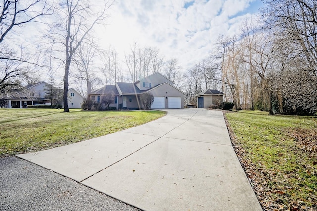 view of front of property with a front yard and a garage