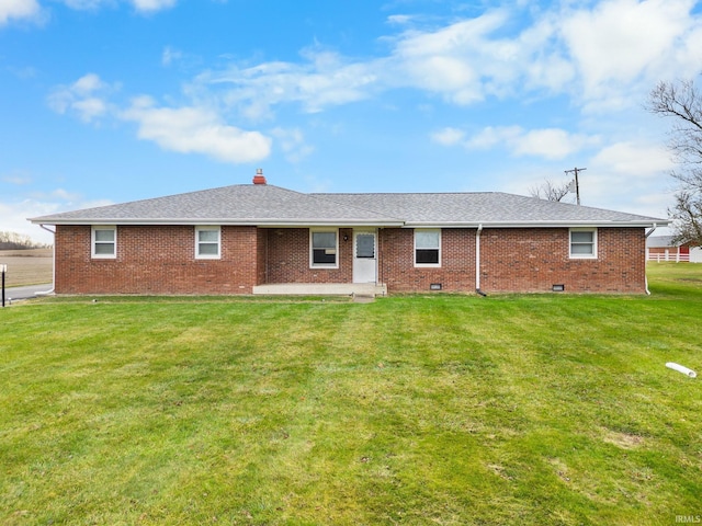 back of house with a yard