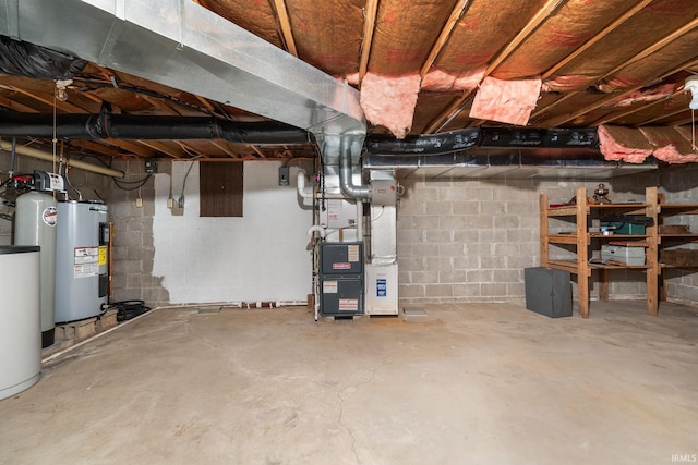 basement featuring electric water heater and heating unit