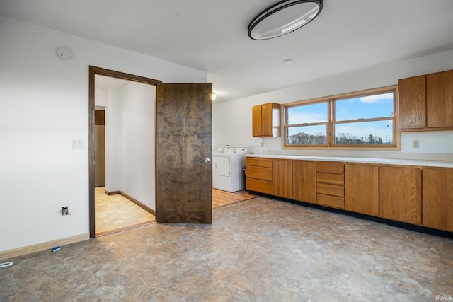 kitchen featuring separate washer and dryer