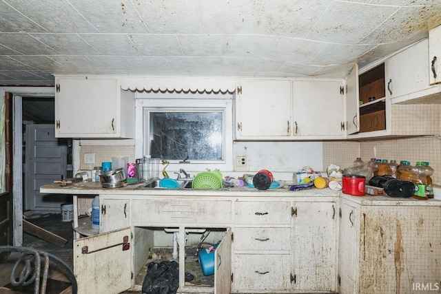 kitchen with white cabinets