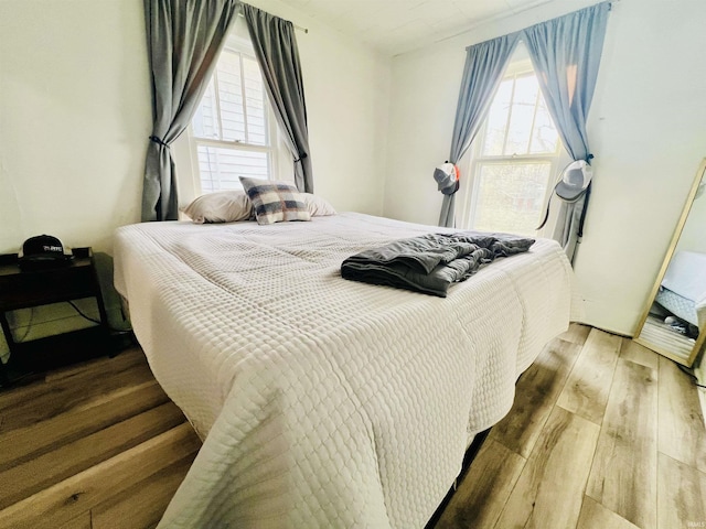 bedroom featuring hardwood / wood-style floors