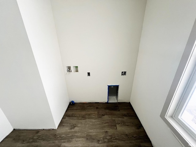 laundry room featuring dark hardwood / wood-style flooring and hookup for a washing machine