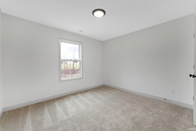 view of carpeted spare room