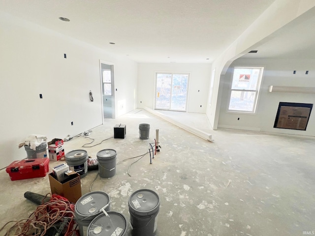 unfurnished living room with a fireplace