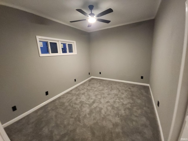 carpeted empty room featuring ceiling fan