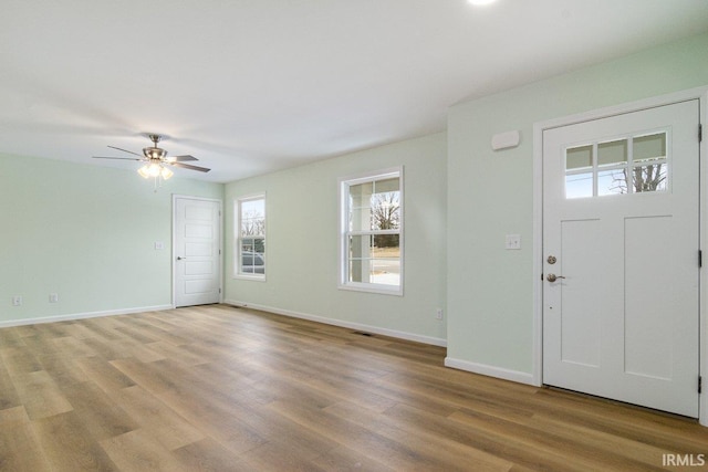 3711 Kansas Rd, Evansville, IN 47725 - entrance foyer featuring light wood-type flooring and ceiling fan