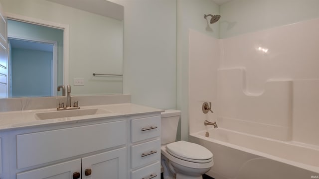 full bathroom with shower / washtub combination, vanity, and toilet