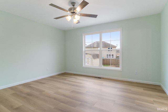 3711 Kansas Rd, Evansville, IN 47725 - empty room featuring light wood-style flooring and a ceiling fan