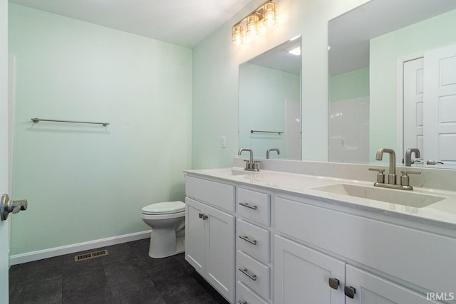 3711 Kansas Rd, Evansville, IN 47725 - bathroom with baseboards and double vanity