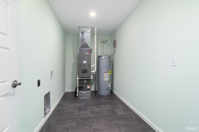 3711 Kansas Rd, Evansville, IN 47725 - utility room featuring electric water heater