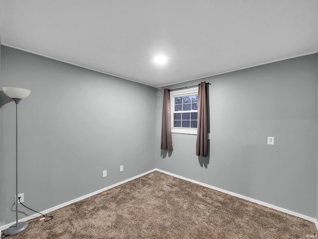 empty room with carpet flooring