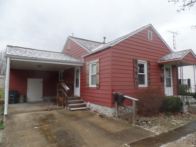 view of front facade with a carport