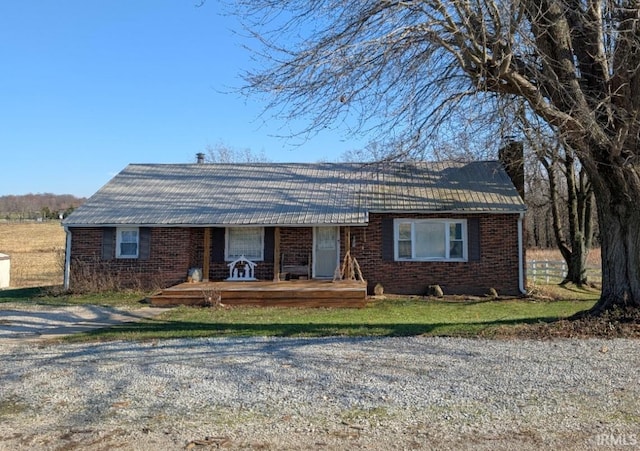 single story home featuring a deck