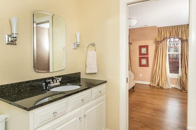 bathroom with wood-type flooring and vanity