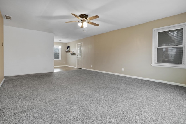 unfurnished room featuring carpet flooring and ceiling fan