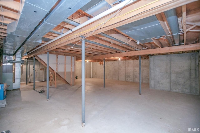 basement featuring heating unit