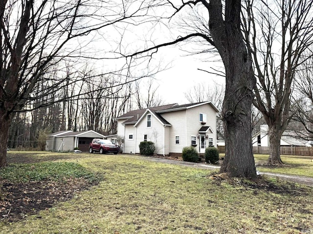 view of home's exterior with a lawn