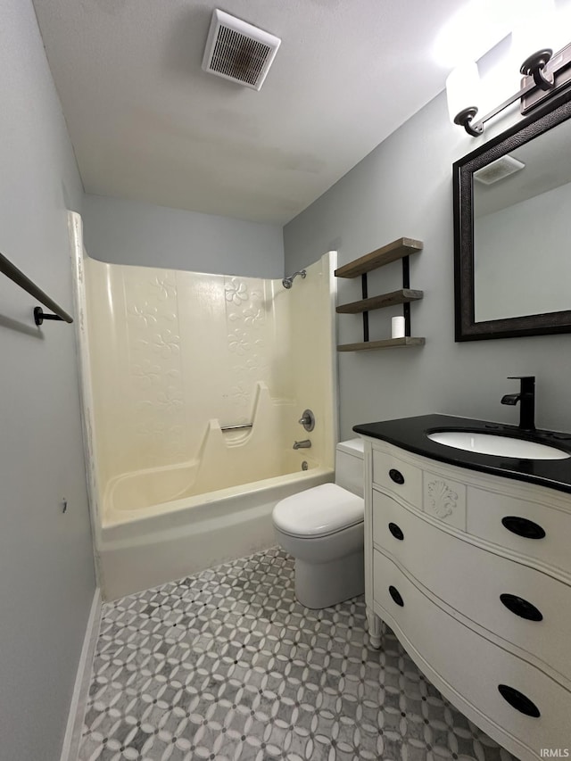 full bathroom featuring vanity, toilet, and tub / shower combination