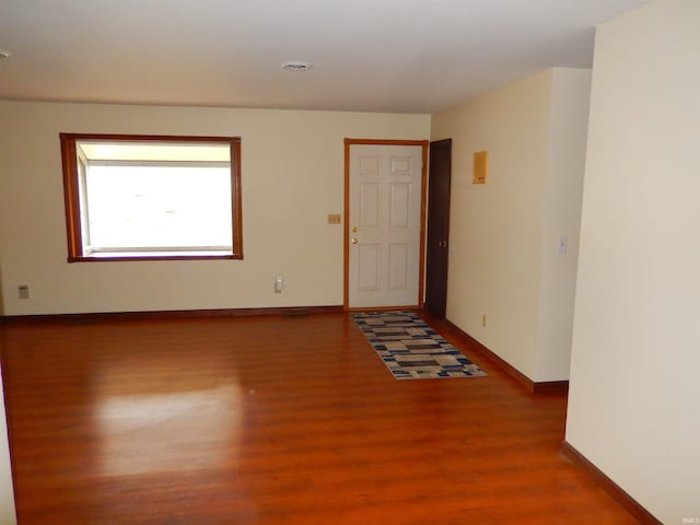 spare room featuring hardwood / wood-style floors