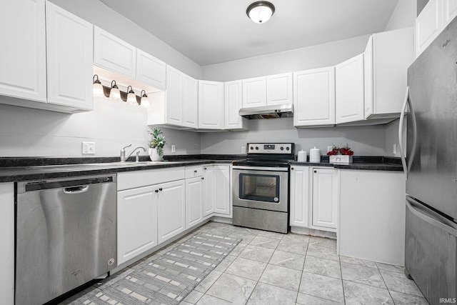 kitchen with white cabinetry, sink, and stainless steel appliances