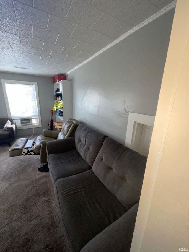 carpeted living room featuring ornamental molding