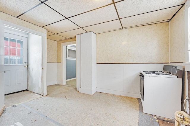 basement featuring a drop ceiling