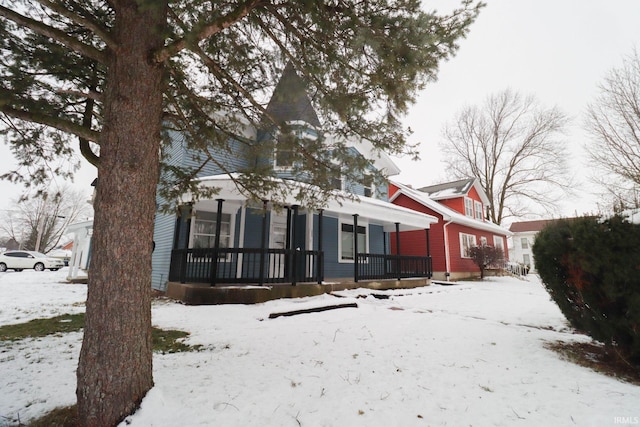 view of snow covered property