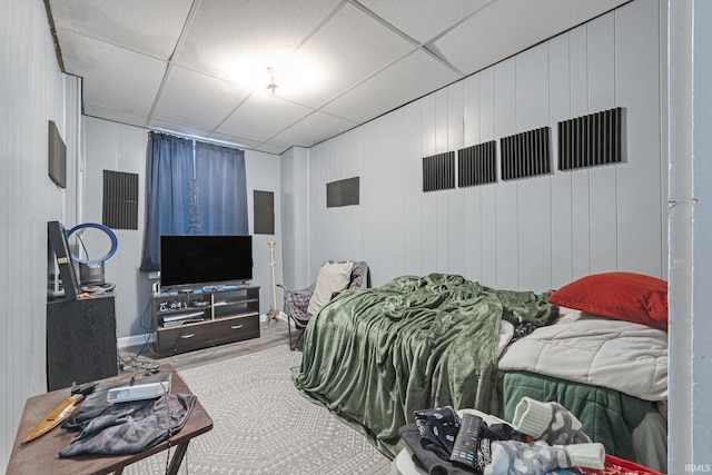 bedroom with a paneled ceiling