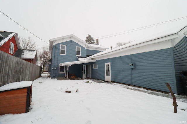 view of snow covered property