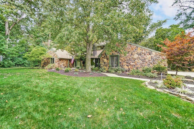 view of front of home with a front lawn