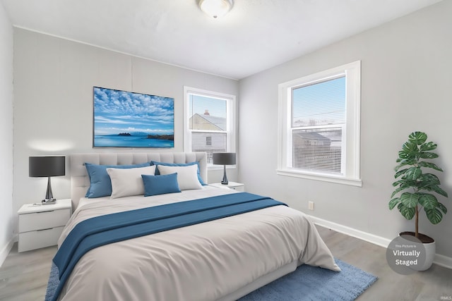 bedroom featuring hardwood / wood-style flooring