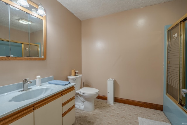 full bathroom featuring vanity, toilet, enclosed tub / shower combo, and a textured ceiling