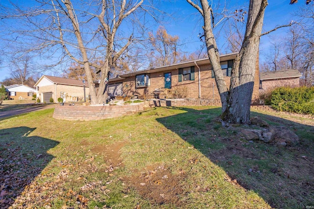 ranch-style house with a front lawn